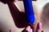 Met dildo in slaapkamer